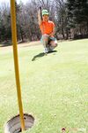Japanese golfer Nana Kunimi flashes no panty upskirt while lining up a putt