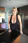 Astounding MILF Sandra Otterson lets her big natural boobs breath
