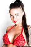 Hot tattoo model Christy Mack poses non nude in red bikini with matching heels