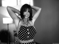 Buxom housewife Sandra Otterson modelling sexy crotchless bodystocking