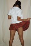 Pigtailed Indian honey Sunny Leone rubs her twat while eating a popsicle