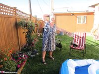 Fatty mature granny Girdle Goddess peels to enjoy wading pool skinny dip