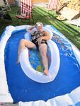 Fatty mature granny Girdle Goddess peels to enjoy wading pool skinny dip