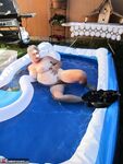 Fatty mature granny Girdle Goddess peels to enjoy wading pool skinny dip