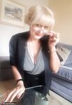 Beautiful mature Lorna Blu exposes great big boobs for hot titjob with cumshot