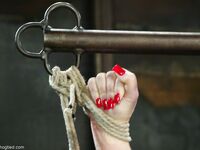 Plump lady Christina Carter feels the weight of nipple clamps on her big tits