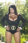 Busty ebony girl Vanessa Blue stripping down naked and posing in the sunshine