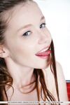 Nude teen girl Emily Bloom exhibiting tight ass and shaved vagina in bath