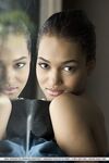 Black glamour model Noel Monique freeing girl parts from red lingerie