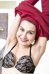 Dark haired teen with hairy armpits Eva Black strips and toys her bush