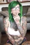 Green haired glasses wearing hottie exposes huge melons & spreads pussy lips