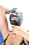 Bubble butt MILF pornstar Julia Ann dons full face rubber mask for BBC blowjob