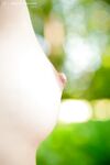 Amateur glasses laden chick Nora spreads her hairy vagina outdoors