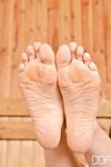Kinky Aleska Diamond exposing her sexy wet feet and yummy pussy in the sauna