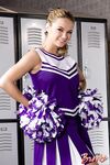 Sexy blonde cheerleader Ashlynn Brooke spreading naked in the locker room