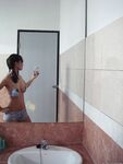 Playful Asian babe Lana Selfshot demonstrating trimmed pussy and fingering