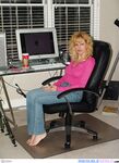 Horny mature Racquel Devonshire talks on the phone while taking a shot of cum