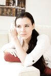 Pretty brunette with gorgeous face Valeria A lounging on sofa in the nude