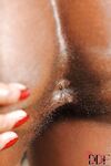 Cute ebony babe Jasmine pours a lot of oil into her anal hole