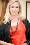 Luscious granny Annabelle Brady takes her dress & pantyhose off in the mirror