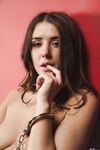 Sybil A gets rid of handcuffs, takes black lingerie off, and remains in collar