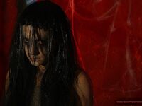 Mistress Kathia Nobili screws submissive lesbian Henessy with large strapon