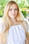 Cute teen takes off her clothes and goes for a naked walk down the road