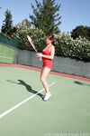 Curvy brunette Penny Flame flaunts hot ass & deep cleavage in her tennis dress