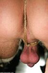 Dominatrix Penny Flame instructs her male slave thru pussy eating session