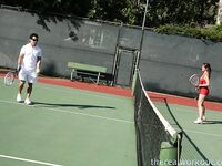 Sexy Penny Flame entices with ass & cleavage in tight dress on a tennis court