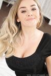 Blonde Melissa D shows off her killer boobs and tight booty in lingerie