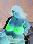 SSBBW takes off her glasses prior to getting naked and masturbating