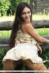 European glamour model Sofi A revealing perfect breasts in country field