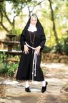 Thick nun bares her big naturals before showing her ass and twat in courtyard