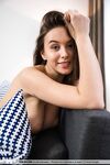 Totally naked teen Alisa I shows off her great body on a living room sofa