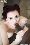 Redhead pinup model Amber Ivy goes hardcore with a big black dick