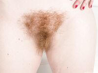 All natural Ana Molly drops her denim shorts to pet her hairy beaver
