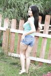 Young and busty teen babe in denim shorts releases big natural boobs