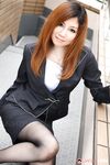 Attractive Japanese MILF Yuria Kanno posing in public in her sexy uniform