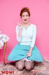 Redhead female Elle Richie removes her clothing with help from vacuum cleaner