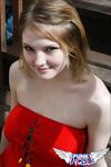 Young white girl Danielle reveals black upskirt panties outdoors
