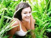 Chubby girl with freckles and big natural boobs spreads hairy cunt outside