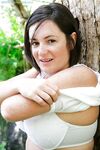 Chubby girl with freckles and big natural boobs spreads hairy cunt outside