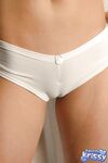 Busty brunette Sweet Krissy bending over & showing cameltoe in white panties