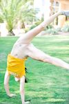 Naughty babe Tasha fists herself & sits on a cone dildo after a kinky workout