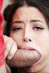 Cute Asian teen Daisy Haze sucking on an unbelievably large dick