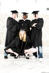 Blonde grad in heels spreads to flash nude upskirt in interracial group grope