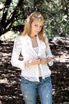 Amateur teen Jane Franklin posing in her white shirt and tight jeans outdoors