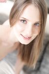 Blue eyed flat chested Nimfa toys her horny amateur pussy solo on the couch