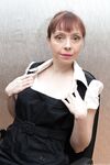 Mature office hottie Trixie playing with her bushy snatch in her workplace